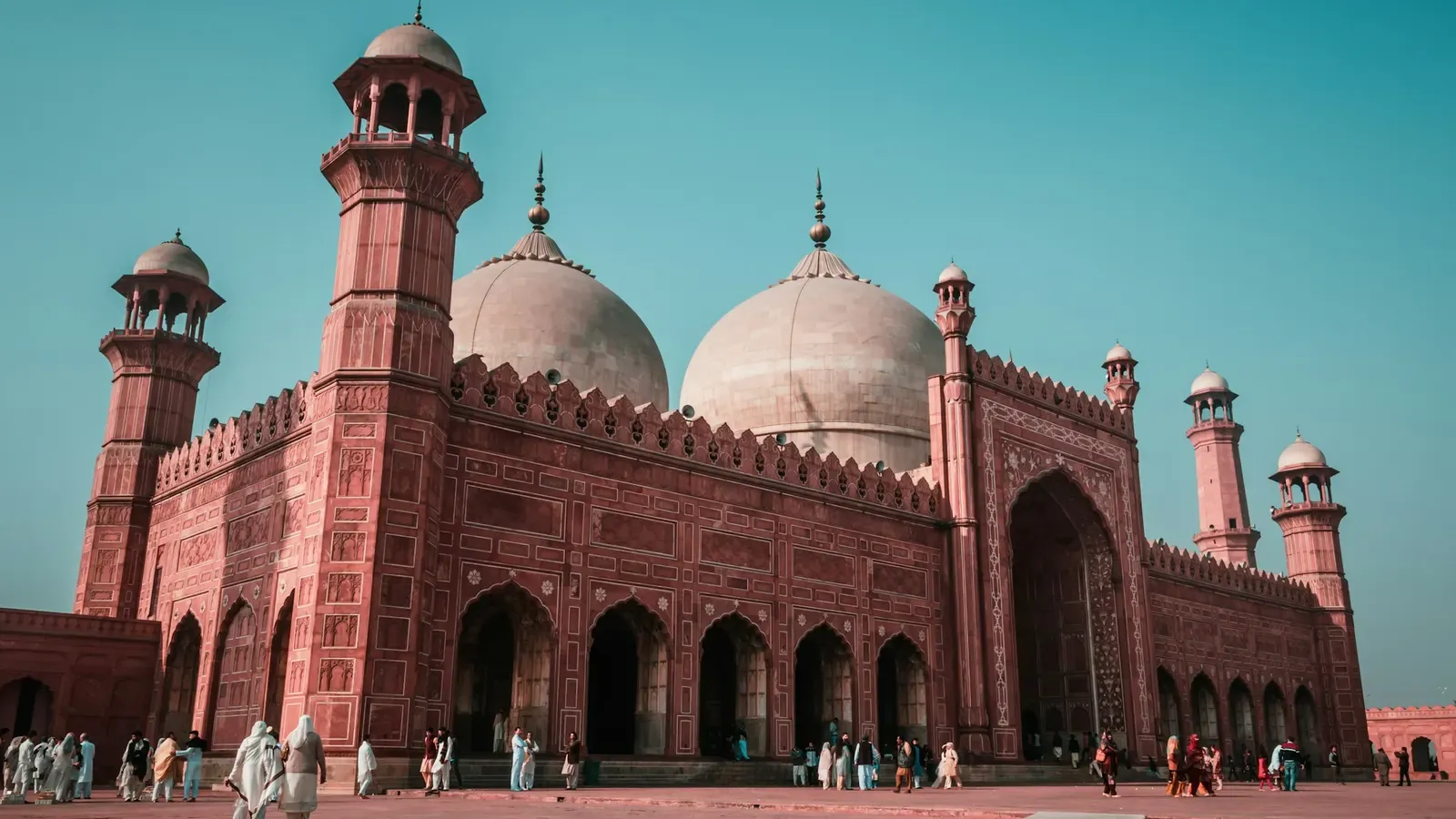 The Badshahi Mosque in Lahore, Pakistan, under a clear blue sky